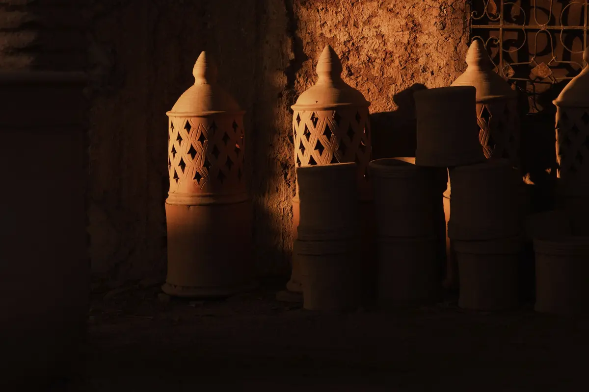 Pierced clay lanterns in the half-light